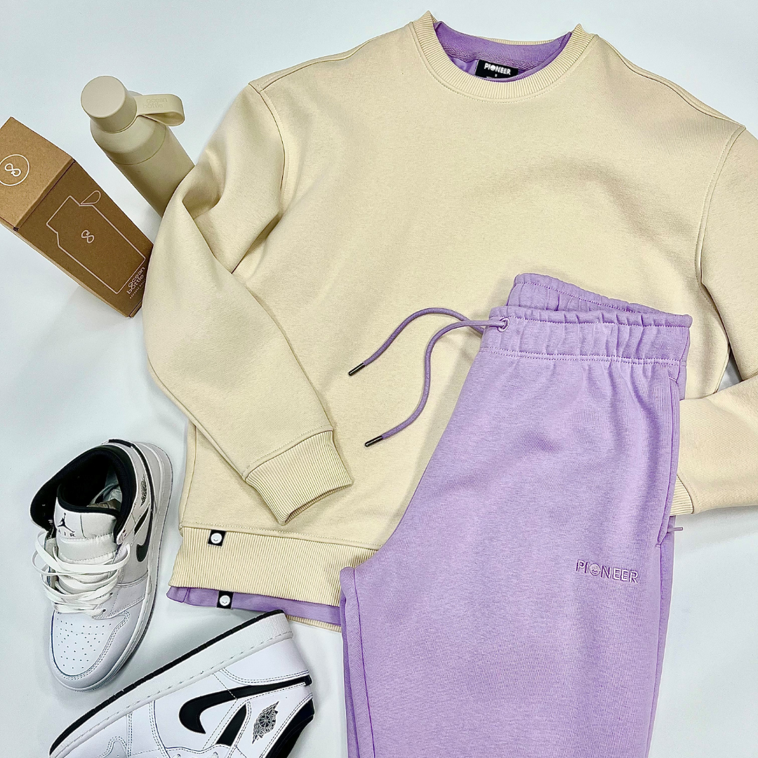 Flat lay shot of Pioneer Clothing sustainably made sweats collection featuring Nike Jordan Trainers 