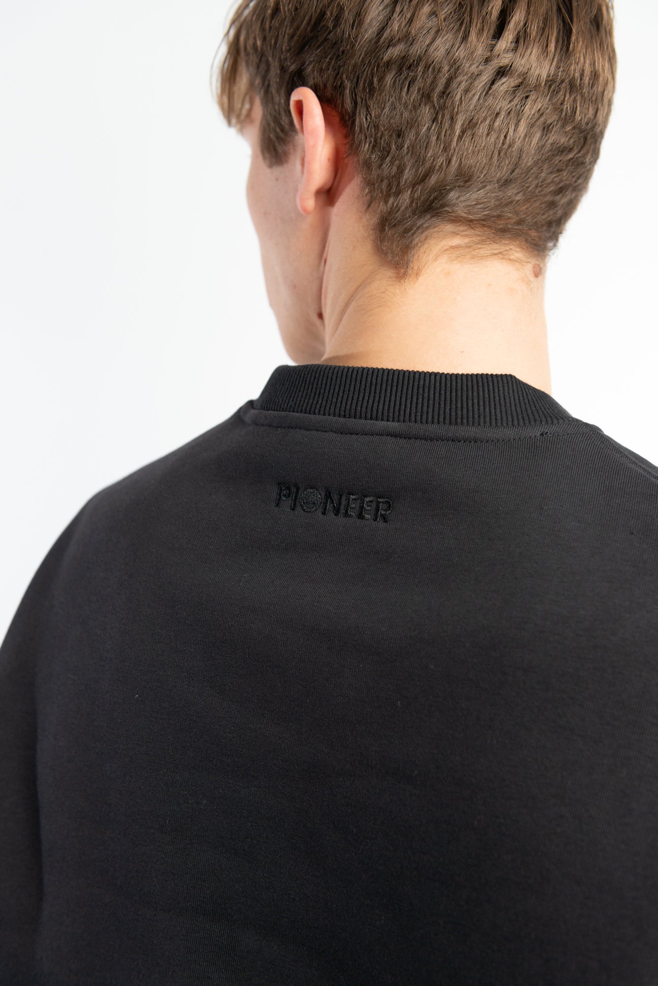 Black Crew Neck Sweatshirt made from sustainable eco-friendly materials