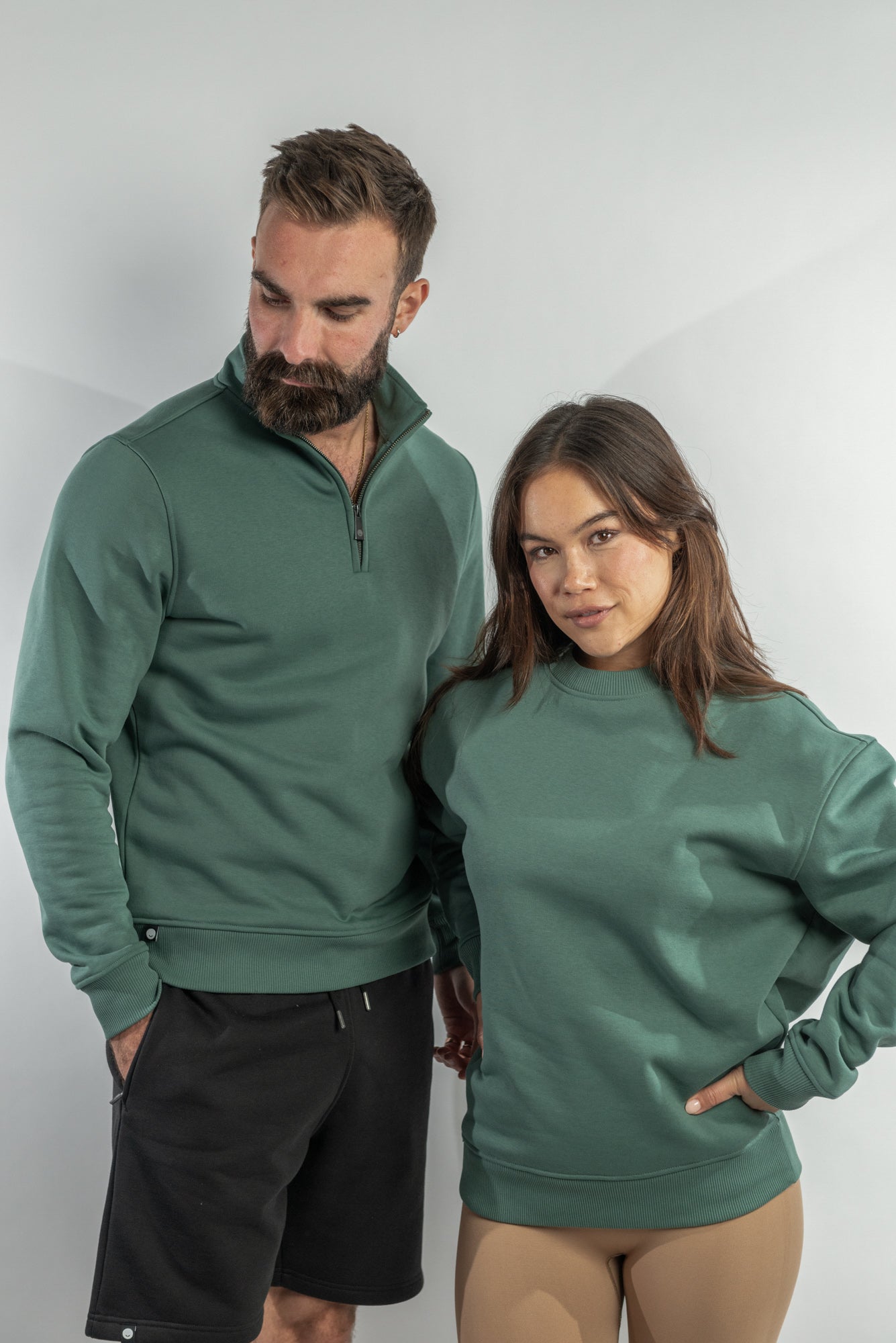 Dark Forest Green Crew Neck Sweatshirt and 1/4 Zip Top made from sustainable eco-friendly materials