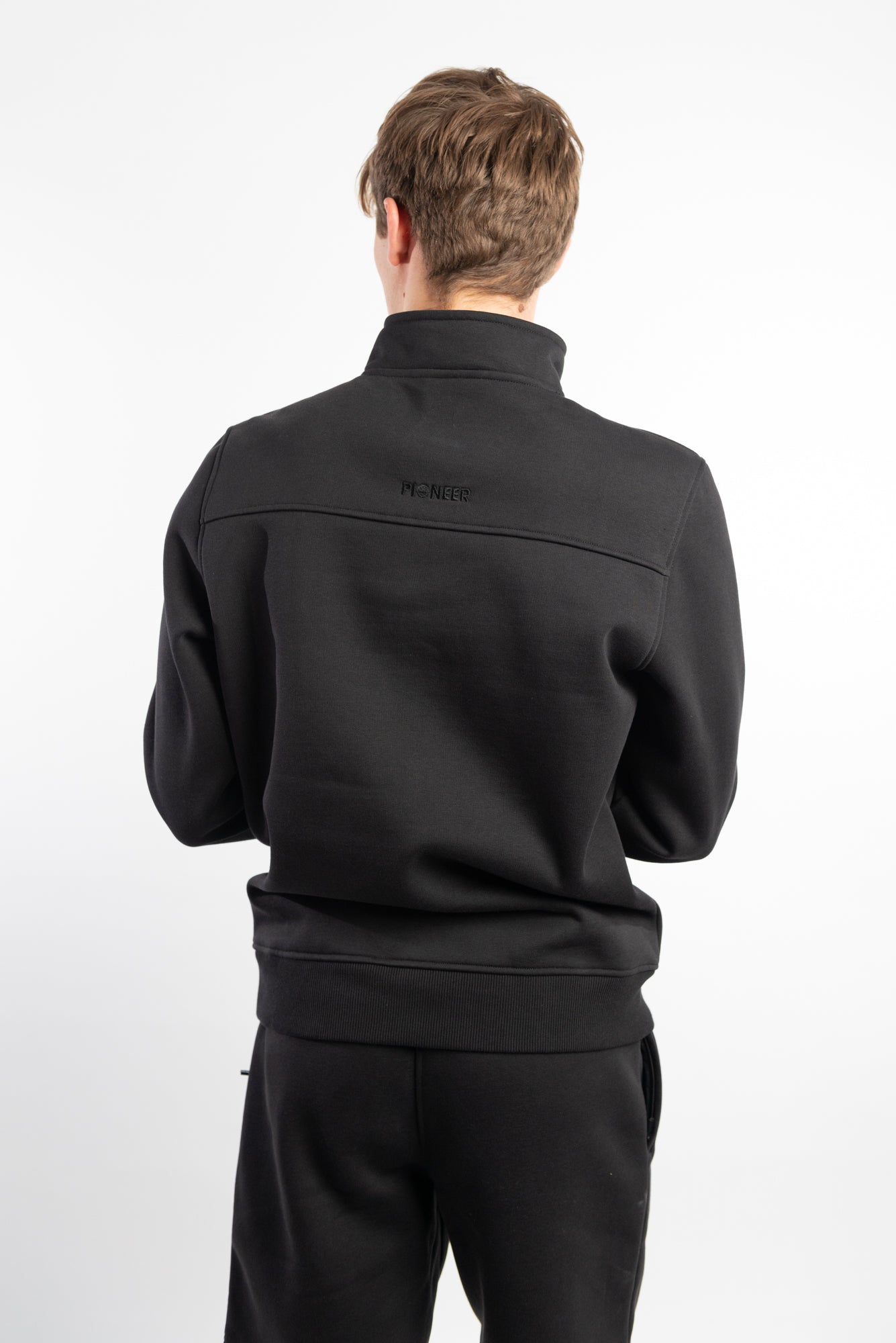 Black Quarter Zip Top made from sustainable eco-friendly materials