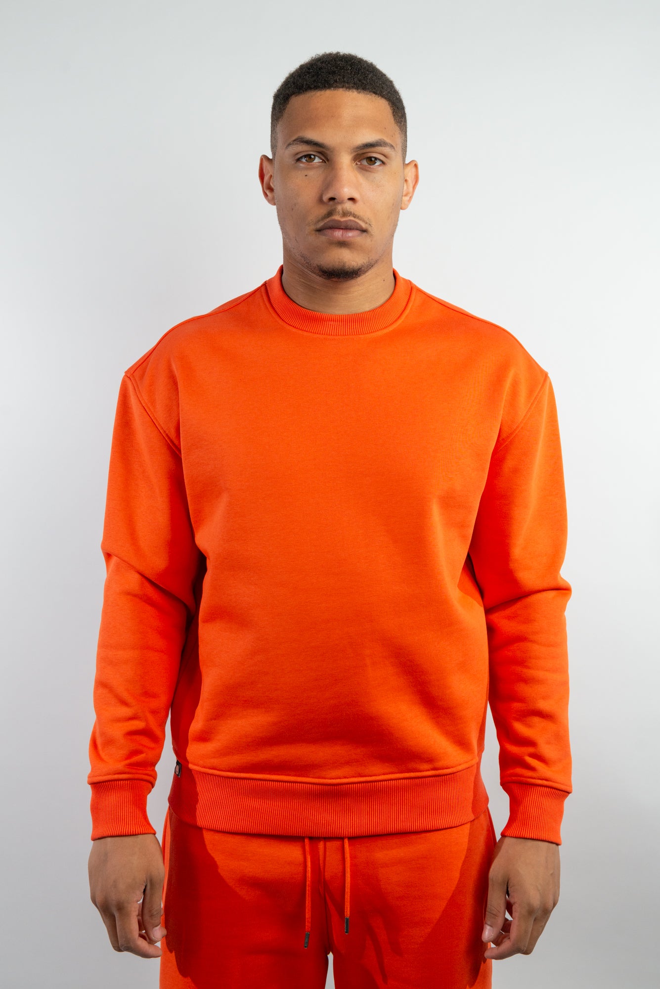 Mandarin Red Crew Neck Sweatshirt made from sustainable eco-friendly materials