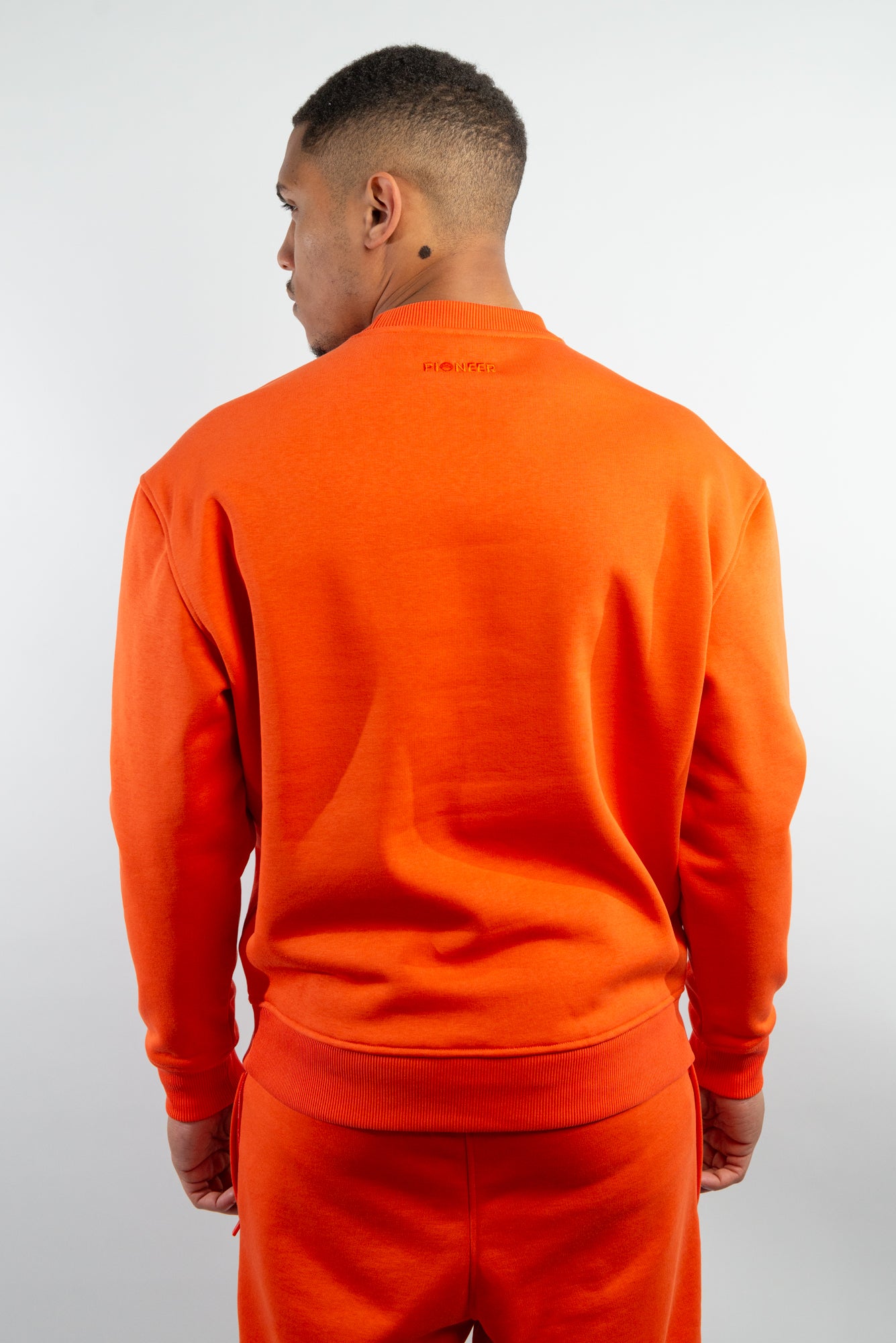 Mandarin Red Crew Neck Sweatshirt made from sustainable eco-friendly materials