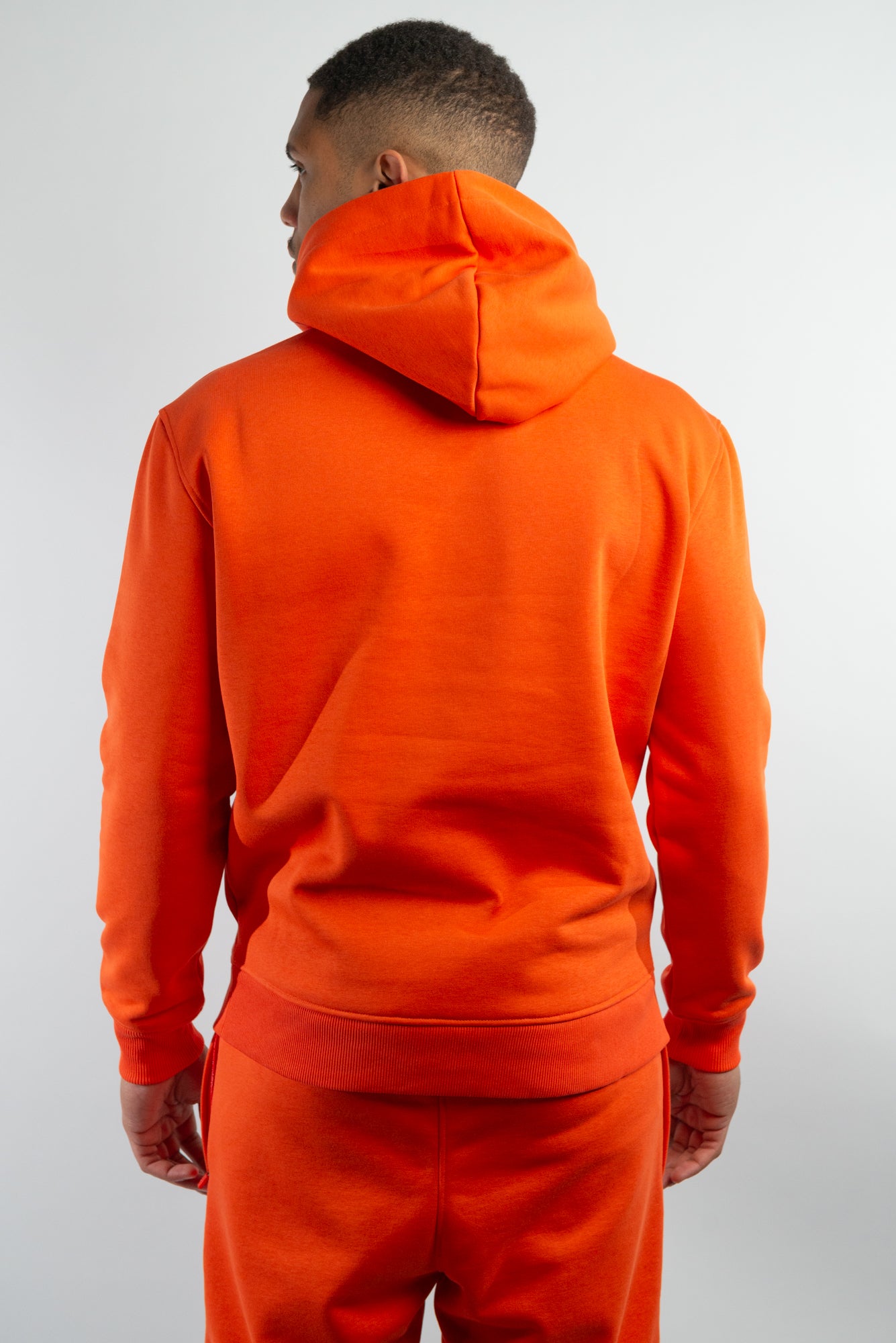 Mandarin Red Hoodie made with organic cotton and recycled materials