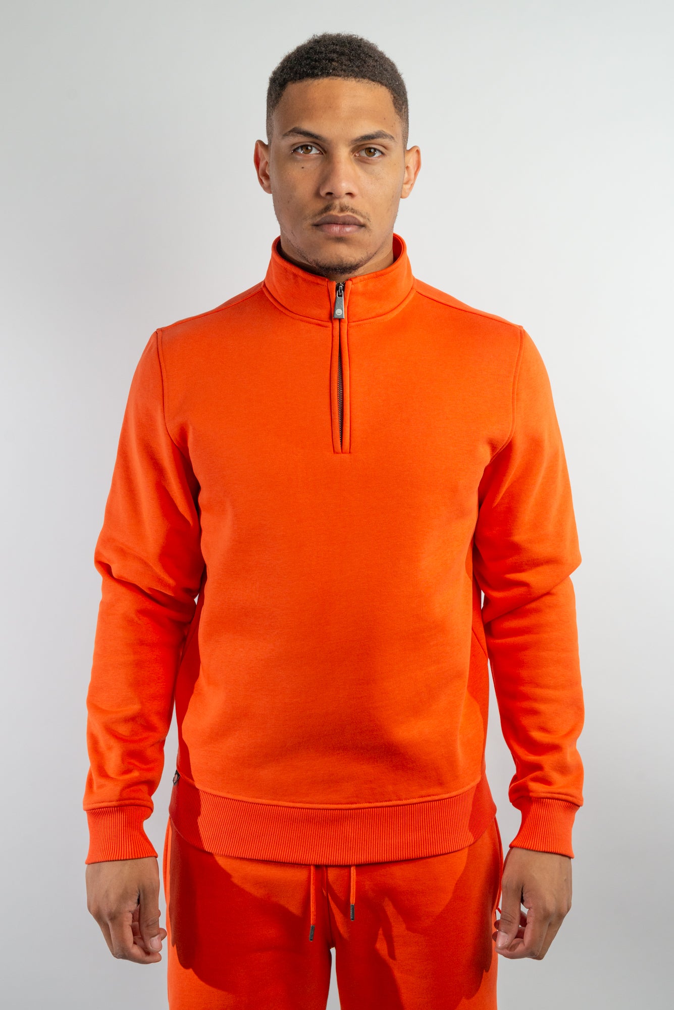 Mandarin Red Quarter Zip Top made from sustainable eco-friendly materials