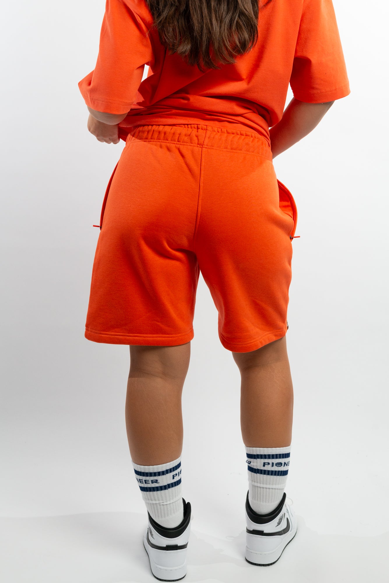 Mandarin Red Shorts made with organic cotton and recycled materials