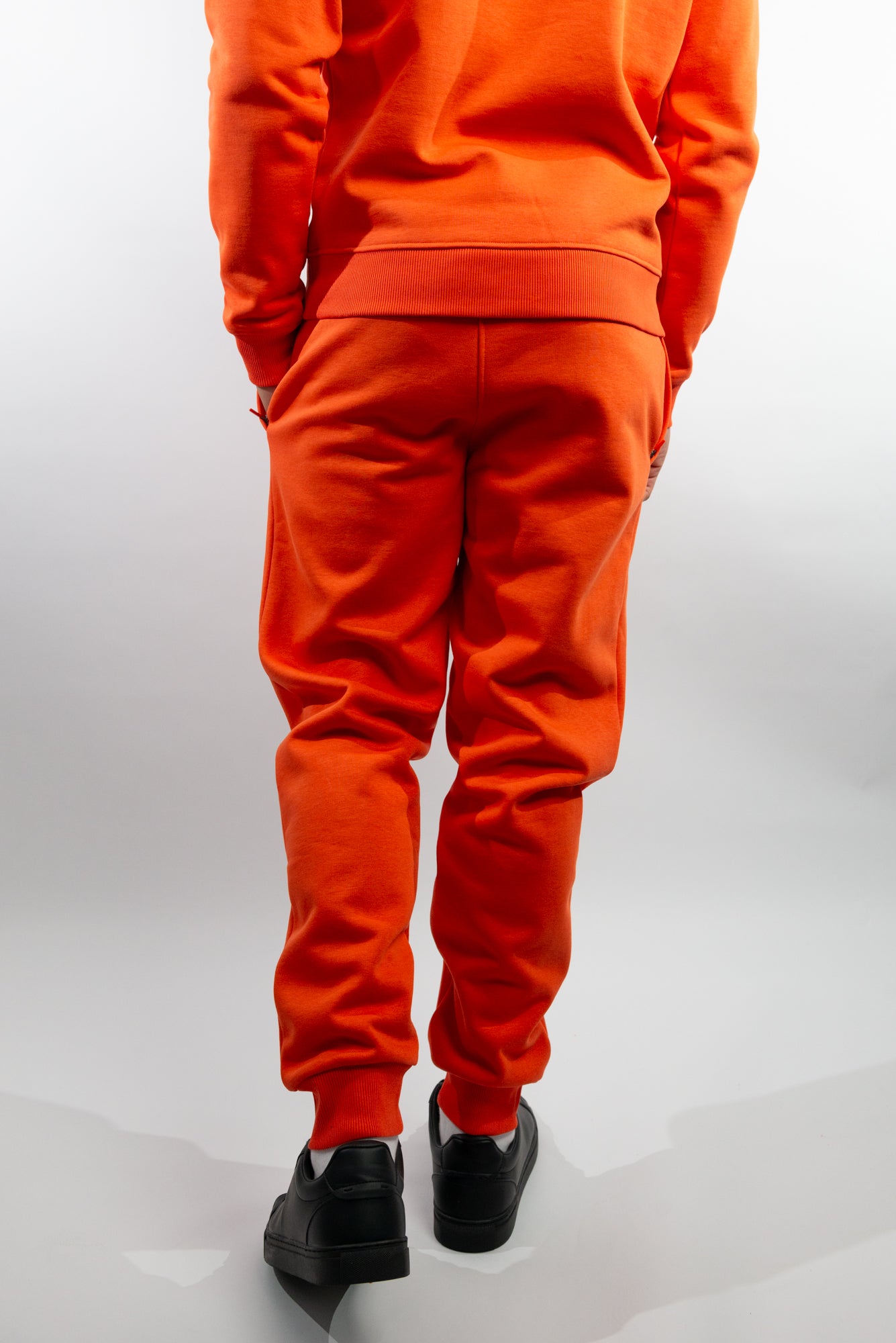 Mandarin Red Joggers made with organic cotton and recycled materials