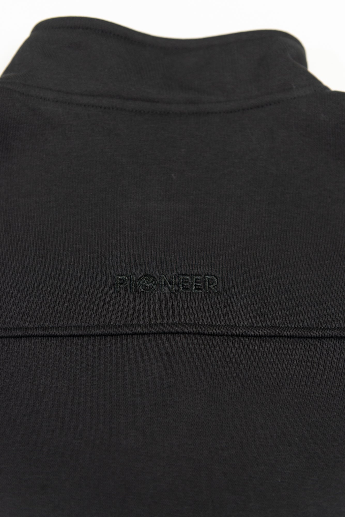 Pioneer_Flat 1 Black Quarter Zip Top